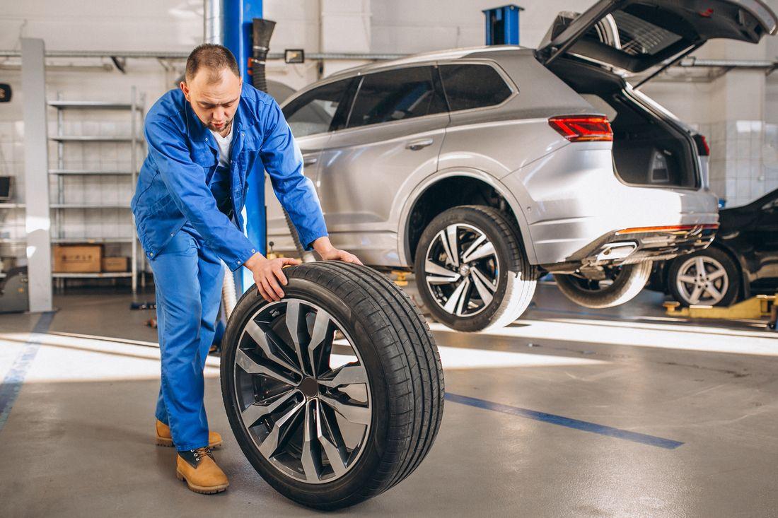 auto-mechanic-checking-car.jpg