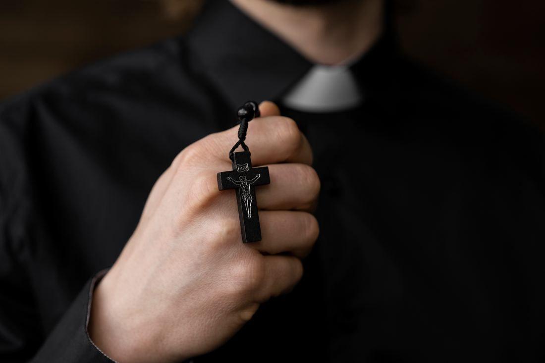 close-up-priest-holding-rosary.jpg
