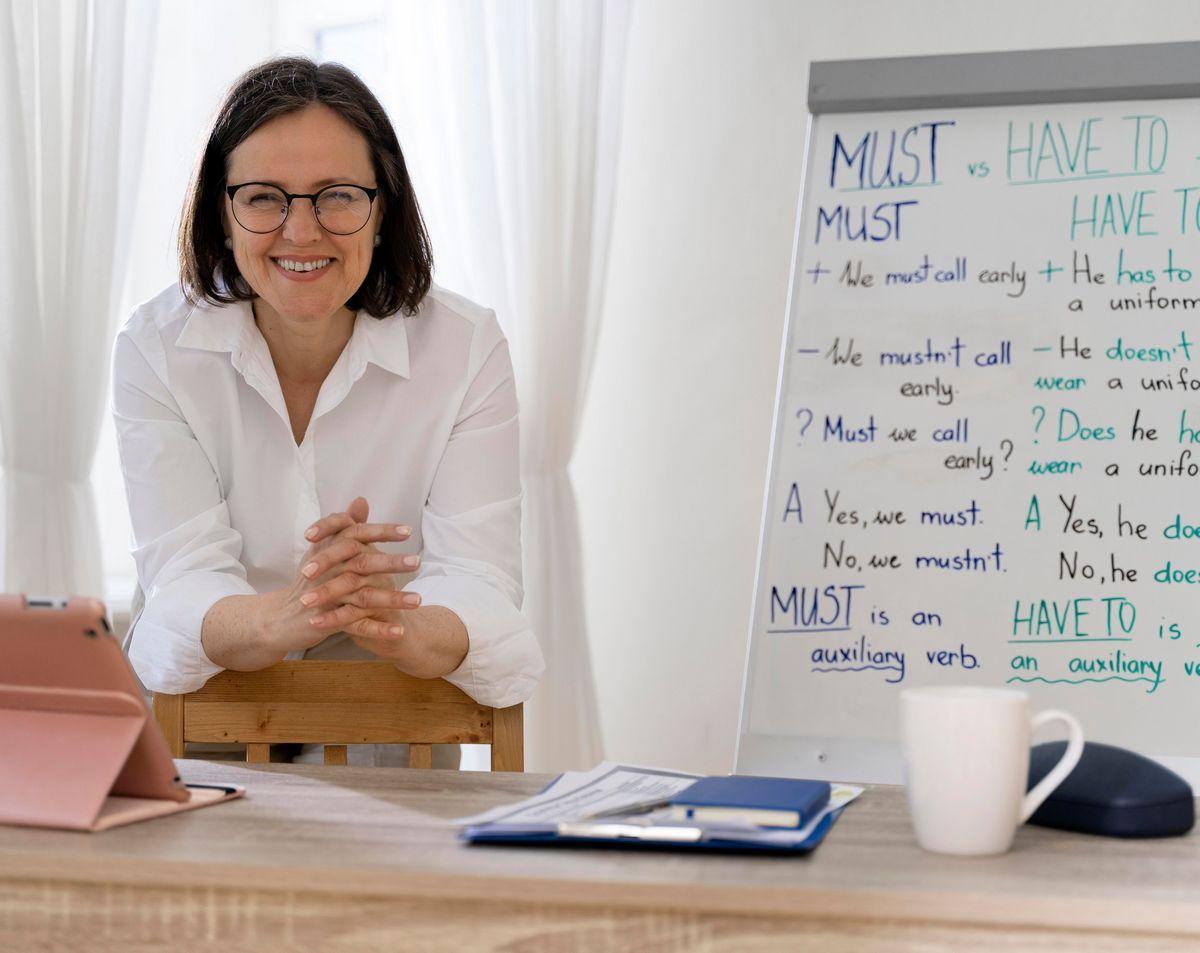 english-teacher-doing-her-class-with-whiteboard.jpg