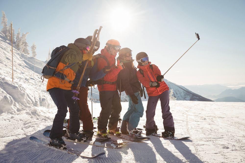 group-skiers-taking-selfie-mobile-phone.jpg