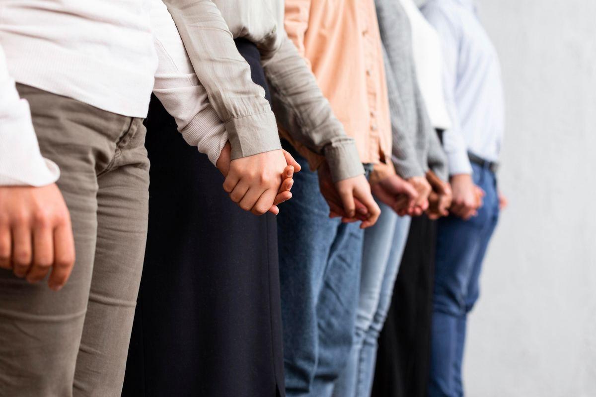 people-holding-hands-group-therapy-session.jpg