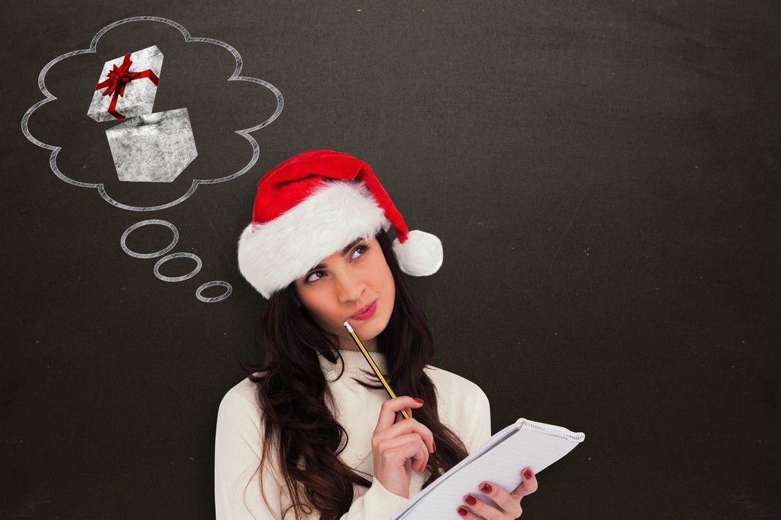 composite-image-festive-brunette-thinking-about-her-christmas-list.jpg