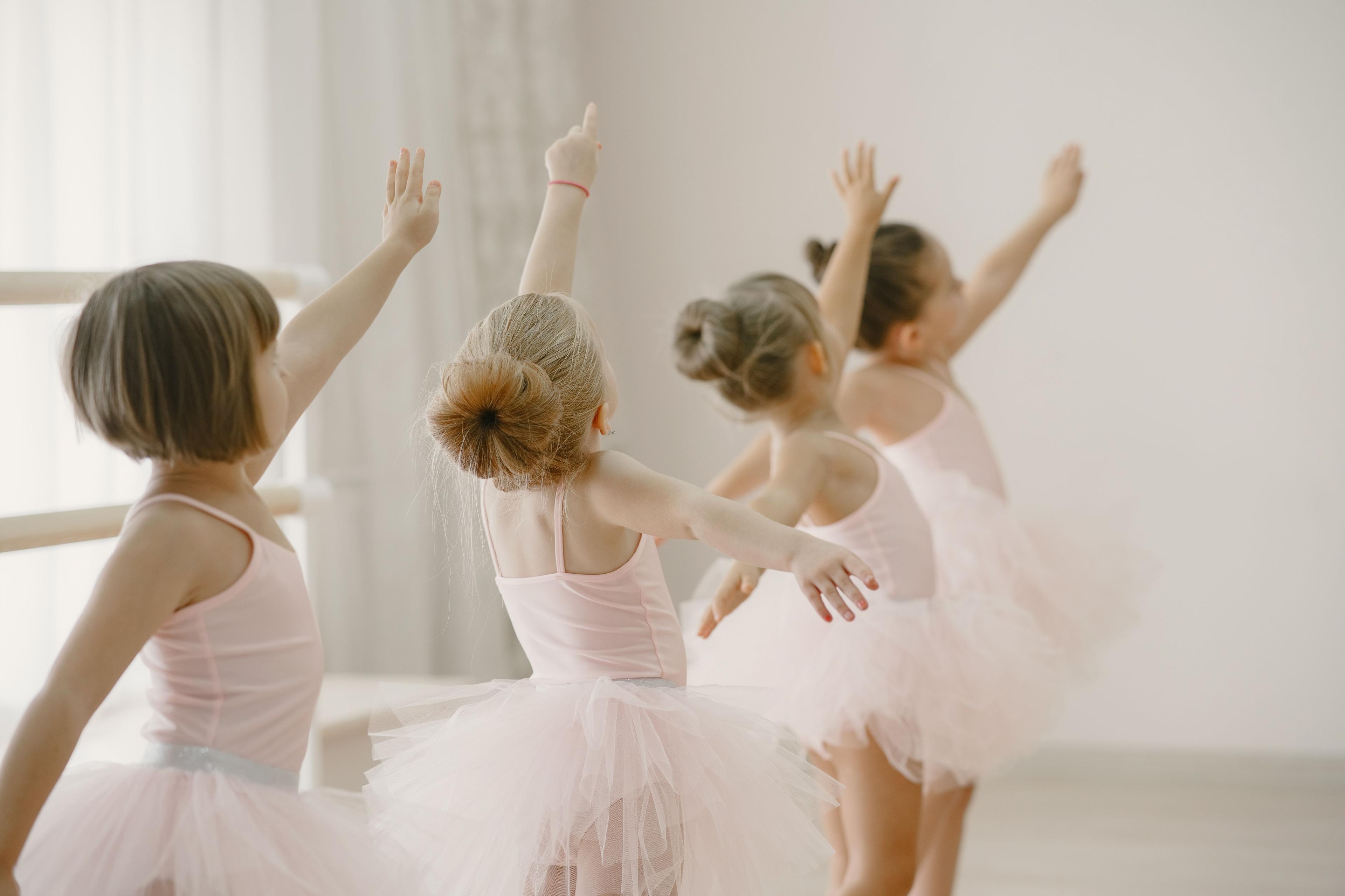 cute-little-ballerinas-pink-ballet-costume-children-pointe-shoes-is-dancing-room.jpg