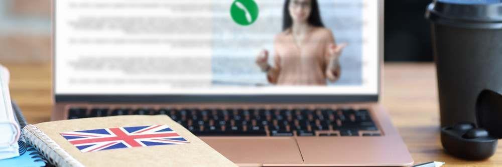 english-textbook-pencil-lying-table-near-laptop-closeup.jpg