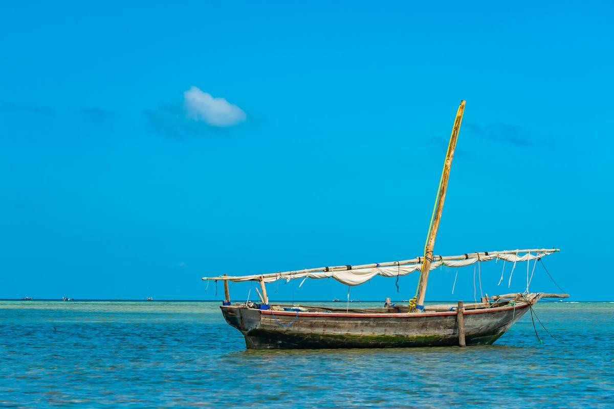 fishing-ship-water-indian-ocean-low-tide-zanzibar-tanzania.jpg