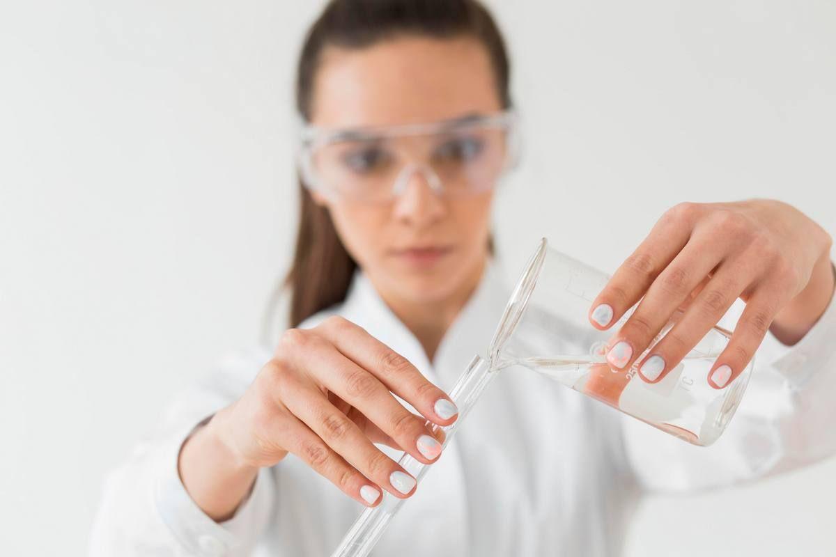 front-view-female-scientist-with-safety-glasses-potions.jpg