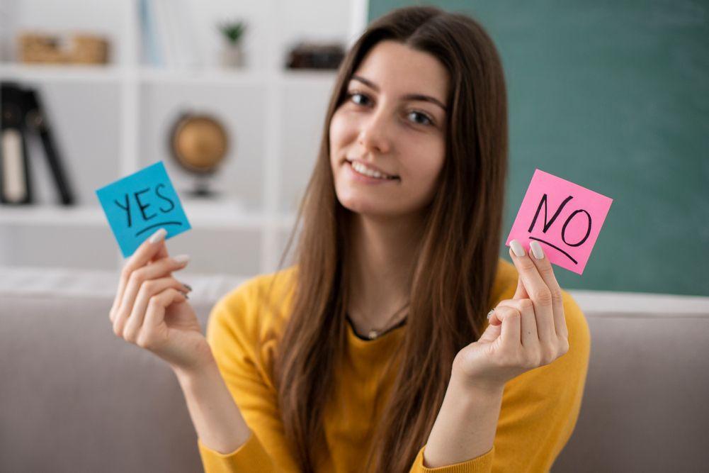medium-shot-smiley-woman-holding-post-its.jpg