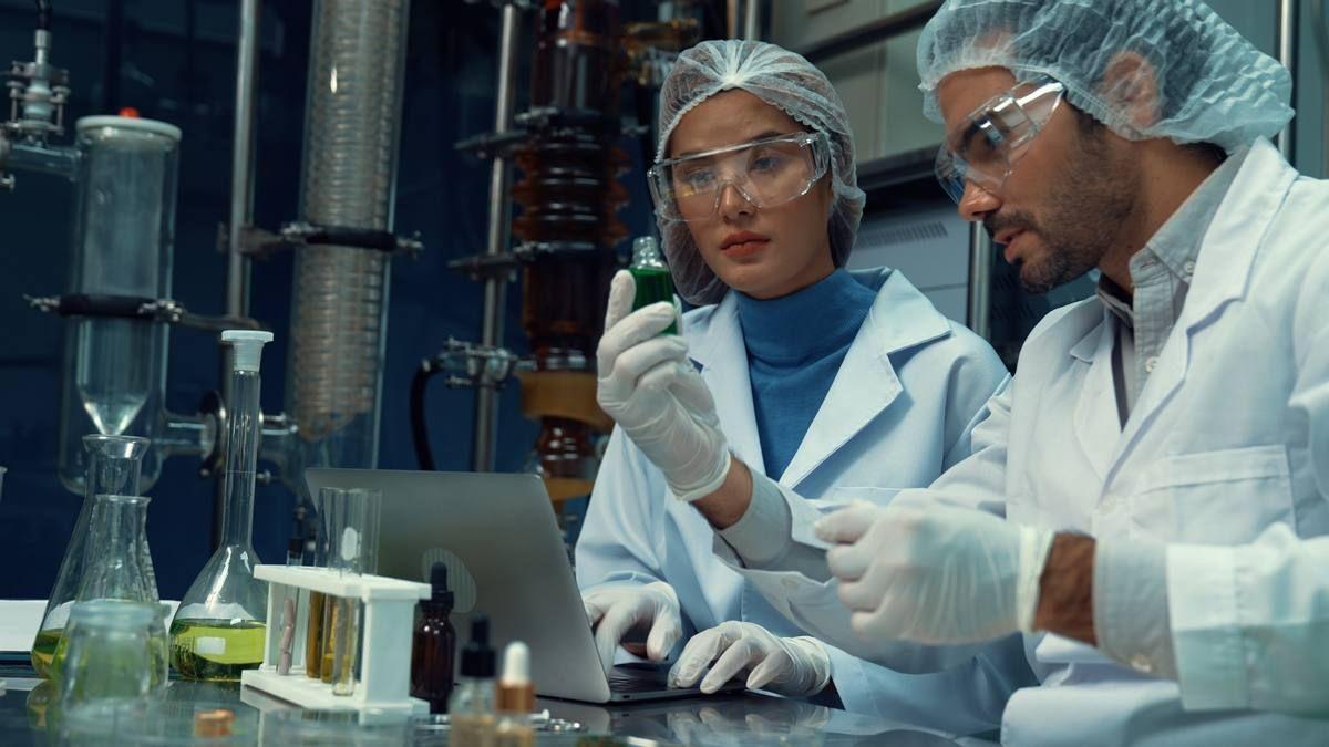 two-scientist-professional-uniform-working-laboratory-chemical-biomedical-experiment.jpg